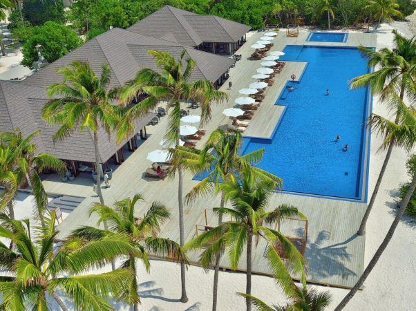 stunning pool view of atmosphere kanifushi resort in maldives
