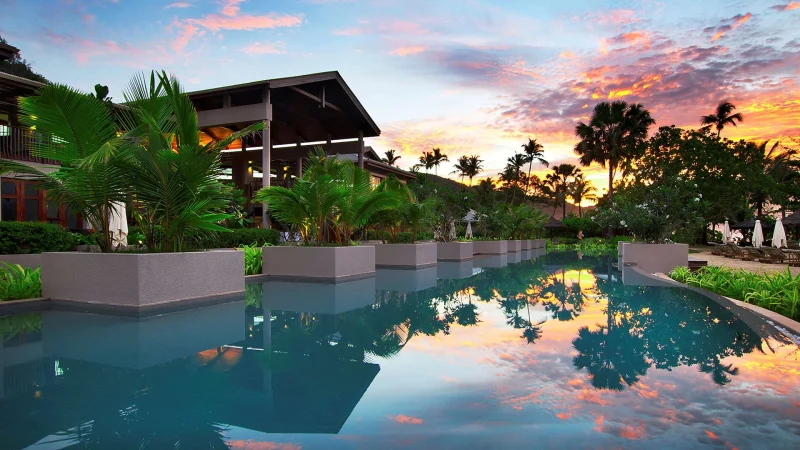 kempinski seychelles resort pool sunset