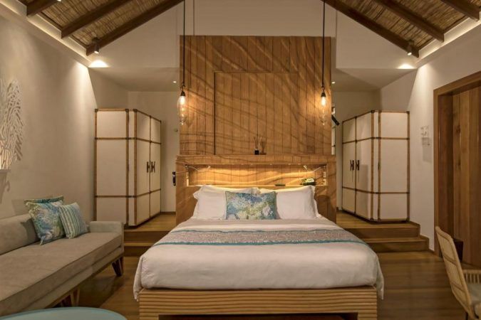 constance moofushi resort sand villa bedroom