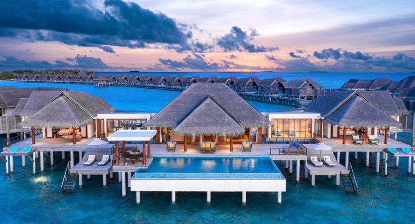 anatara kihavah maldives sunset overwater pool villa